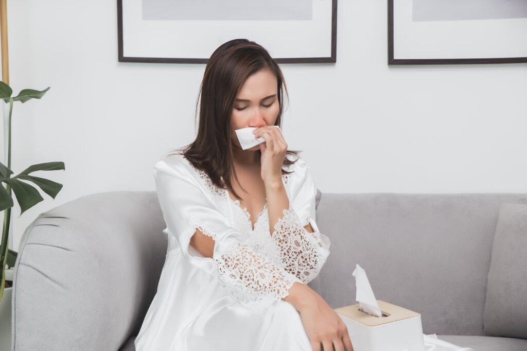 Asian woman iexperienced nasal irritation due to allergies